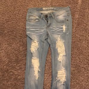Never worn ripped denim jeans